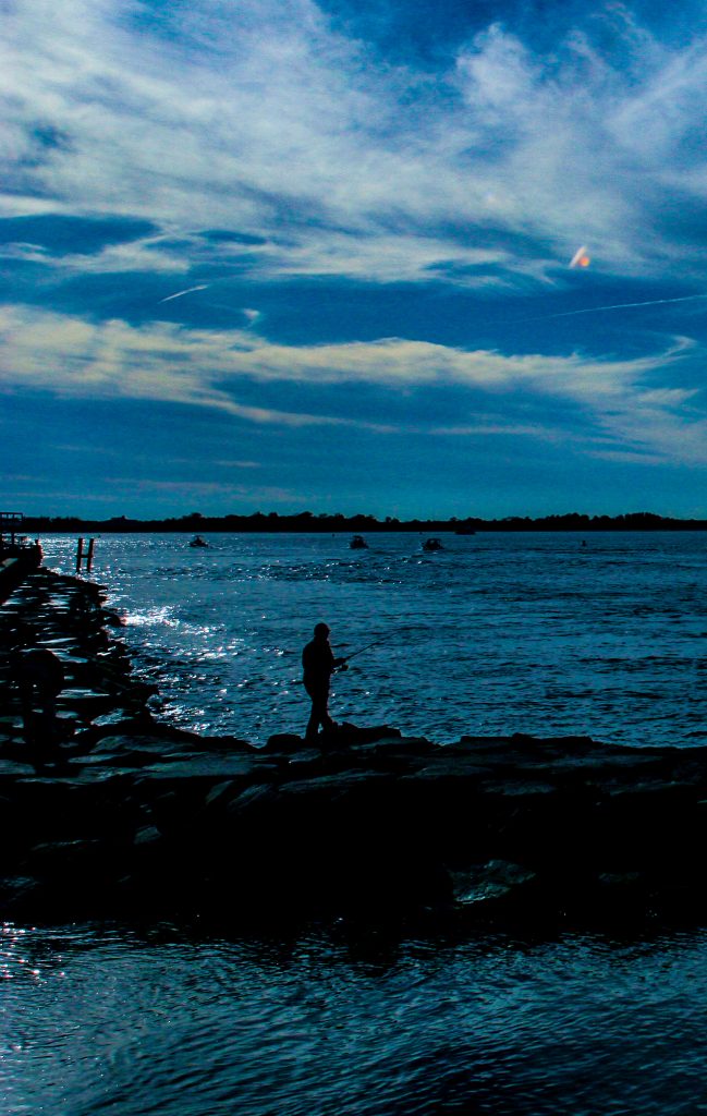 fisherman by the ocean