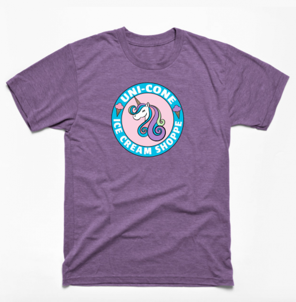 unicorn graphic with circle text on purple t-shirt mockup