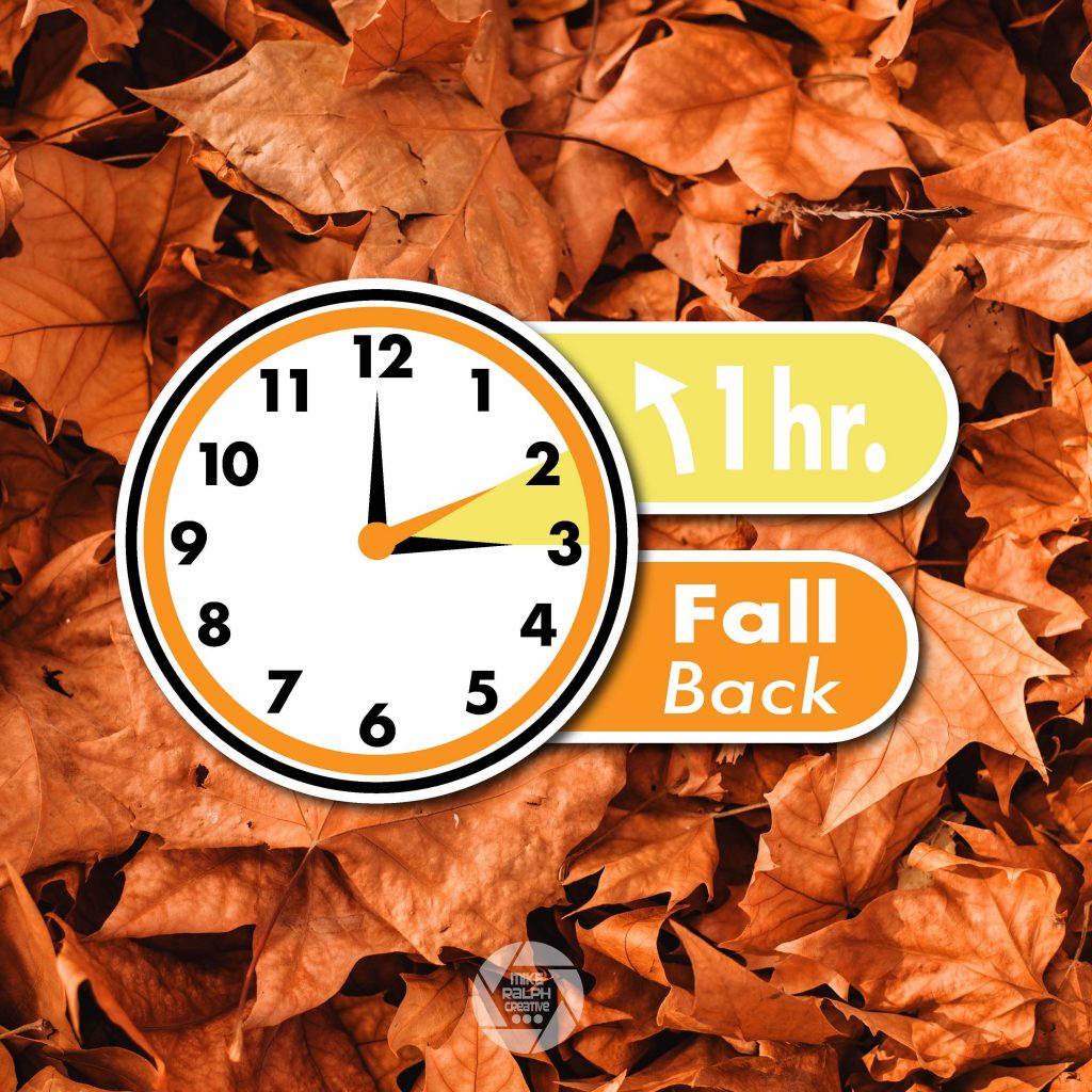 clock design on fall leaf background