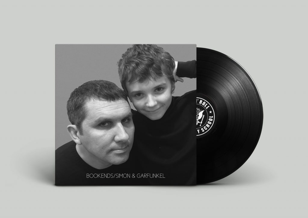 a man and a boy in black & white on the cover of a record mockup